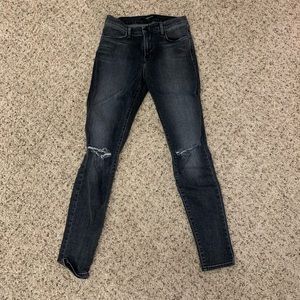 Washed Black Distressed Knee Skinny Jeans by J Brand